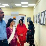 Prof. Dr. Syed Aamir Sohail Din, Faculty of Arts and Languages, University College of Education and Design, Islamia University of Bahawalpur, is reviewing the paintings and designs created by the students of on the occasion of the one-year completion of the Marka e Haq Bunyan un Marsoos celebrations organized by the Islamia University of Bahawalpur