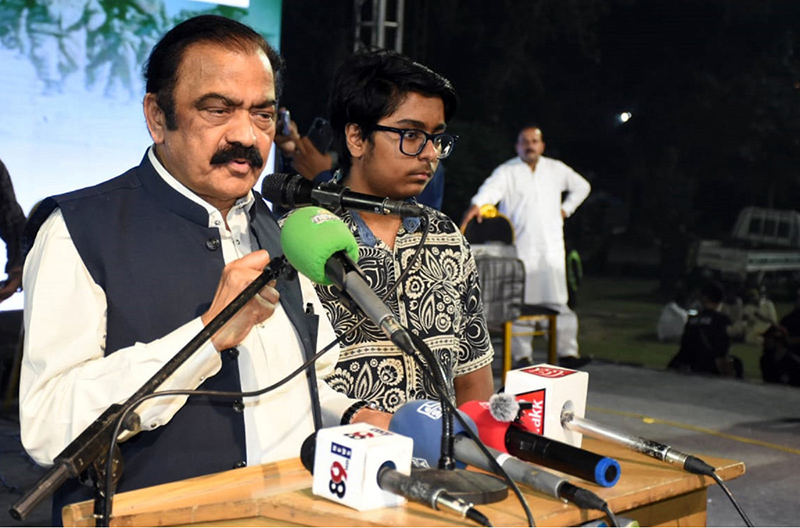 Adviser to Prime Minister (PM) on Political and Public Affairs Senator Rana Sanaullah Khan is addressing a public gathering during the first annual commemorative ceremony held at Bohranwali Ground on completion of one year of the historic success of Marka-e-Haq on late Saturday night