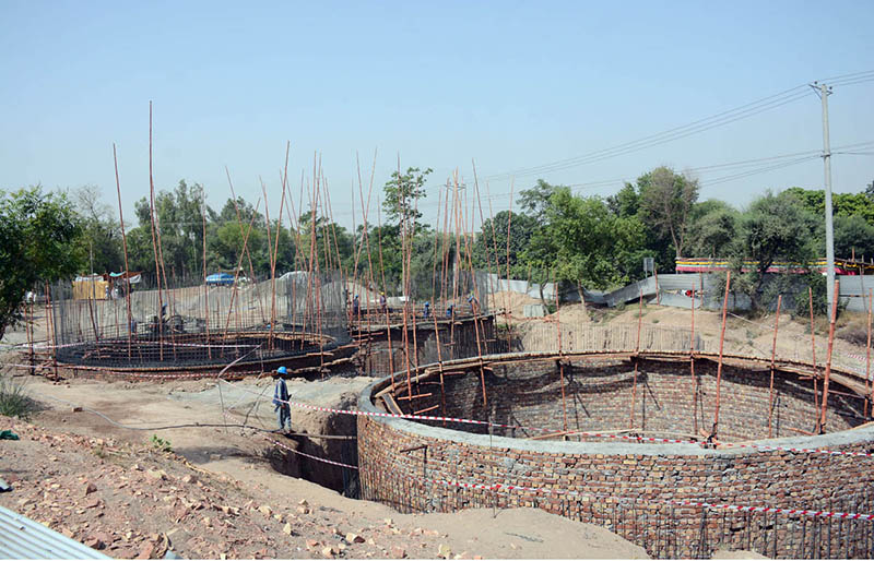 Labourers are busy constructing a new sewage disposal system at Sohni Dharti Chowk