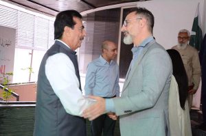 U.S. Consul General, Stetson Sanders shaking hands with Chairman Senate, Syed Yousaf Raza Gilani during a call on