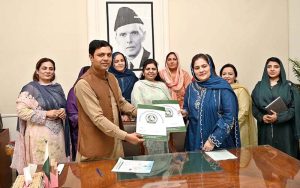 District Placement Officer TEVTA Nauman Malik and CEO Taji Handicraft Saira Rehman exchanging copies of MoU after signing a MoU to train girls students under program titled “Learn with Earn" Principal Government College of Technology for Women Amara Akram and members of Sargodha Women Chamber of Commerce and Industry also there at Government College of Technology for women.