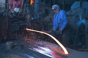 Labourers work at an iron factory in an industrial area as International Workers' Day is observed worldwide, commemorating the 1886 Chicago workers’ movement for labour rights. In Pakistan, May 1 was declared a public holiday following the country’s first labour policy introduced in 1972