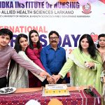 Chairman Chandka Institute of Nursing and Allied Health Sciences S.Iqbal Babu and others cut the cake during a function held to mark International Nursing Day