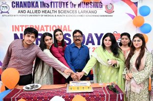 Chairman Chandka Institute of Nursing and Allied Health Sciences S.Iqbal Babu and others cut the cake during a function held to mark International Nursing Day