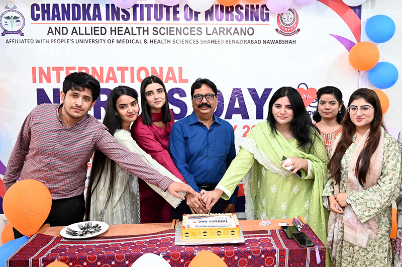 Chairman Chandka Institute of Nursing and Allied Health Sciences S.Iqbal Babu and others cut the cake during a function held to mark International Nursing Day