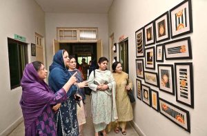 District Placement Officer TEVTA Nauman Malik and CEO Taji Handicraft Saira Rehman exchanging copies of MoU after signing a MoU to train girls students under program titled “Learn with Earn" Principal Government College of Technology for Women Amara Akram and members of Sargodha Women Chamber of Commerce and Industry also there at Government College of Technology for women.