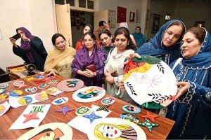 District Placement Officer TEVTA Nauman Malik and CEO Taji Handicraft Saira Rehman exchanging copies of MoU after signing a MoU to train girls students under program titled “Learn with Earn" Principal Government College of Technology for Women Amara Akram and members of Sargodha Women Chamber of Commerce and Industry also there at Government College of Technology for women.