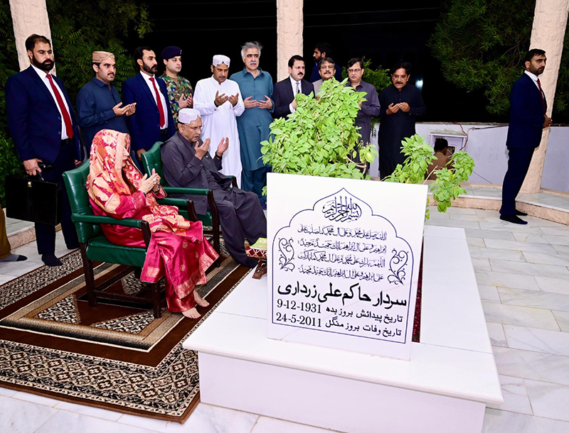 President Asif Ali Zardari offered Fateha and laid flowers on the grave of his father, Sardar Hakim Ali Zardari, at Baloo Ja Quba accompanied by his sister Fauzia Iqbal