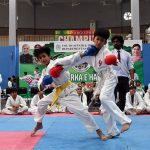 Players are in action during a karate competition held in connection with marking the completion of one year of the victory of Marka-e-Haq Bunyan-ul-Marsoos. organized by District Sports department at Sports Gymnasium
