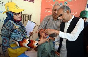 Special Assistant to Chief Minister Sindh Khair Muhammad Sheikh administering anti-polio drops to a child during the inauguration of Four-day anti-polio campaign under the directives of the Health Department Government of Sindh Sheikh Zayed Children's Hospital.