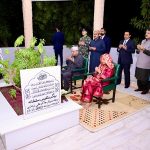 President Asif Ali Zardari offering Fateha and laying flowers on the grave of his mother, Begum Bilqees Sultana, at Baloo Ja Quba accompanied by his sister Fauzia Iqbal