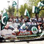 Interfaith harmony workers participate in a Jashn-e-Marka-e-Haq rally outside the Press Club