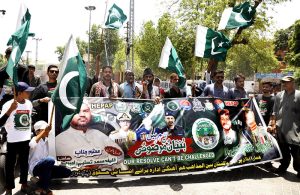 Interfaith harmony workers participate in a Jashn-e-Marka-e-Haq rally outside the Press Club