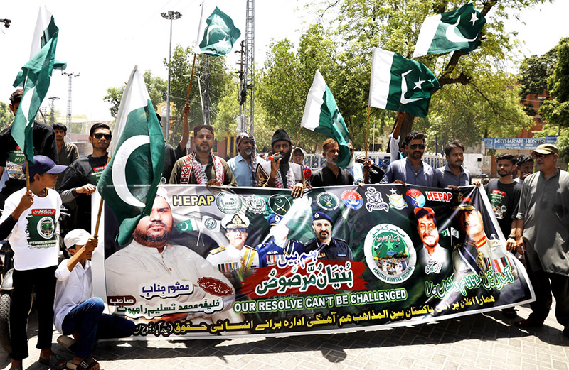 Interfaith harmony workers participate in a Jashn-e-Marka-e-Haq rally outside the Press Club