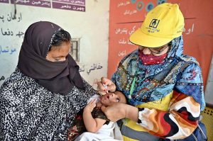 Special Assistant to Chief Minister Sindh Khair Muhammad Sheikh administering anti-polio drops to a child during the inauguration of Four-day anti-polio campaign under the directives of the Health Department Government of Sindh Sheikh Zayed Children's Hospital.