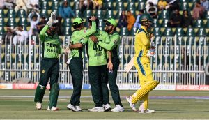 Players of Pakistan national cricket team celebrate the dismissal of Alex Carey during the first One Day International (ODI) between Pakistan national cricket team and Australia national cricket team at the Rawalpindi Cricket Stadium