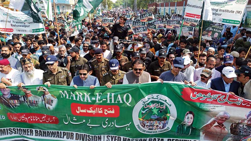 Deputy Speaker Punjab Assembly Malik Zaheer Iqbal Channar leads the Marka-e-Haq Rally while other officers participate in the rally