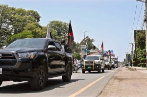 Director Punjab Counter Narcotics Force Sargodha Division Lt. Col (R) Jawad Masood leading flag march at University Road.