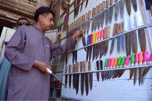 Blacksmith sharpen knives ahead of the Eid al-Adha