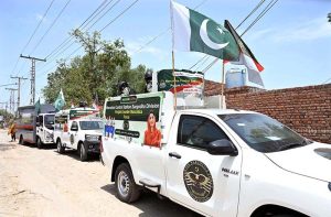 Director Punjab Counter Narcotics Force Sargodha Division Lt. Col (R) Jawad Masood leading flag march at University Road.