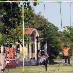 Children are seen enjoying swings at Greater Iqbal Park