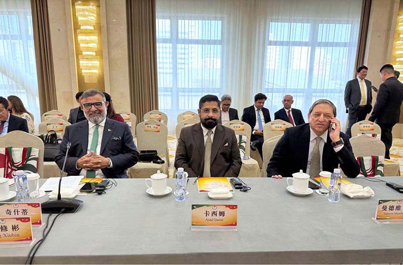 Amir Waliuddin Chishti, Chairman Senate Standing Committee on National Health Services, Asad Qasim and Saleem Mandviwalla attend a ceremony marking the 75th anniversary of Pakistan-China diplomatic relations