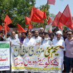 Mazdoor Mahaz Punjab president Dr Ali Ameen leading a rally on International Labour Day in front of District Press Club Sargodha Road