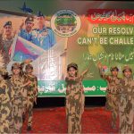 Students perform a tableau marking the completion of one year of the victory of Marka-e-Haq Bunyan-ul-Marsoos at Arts Council