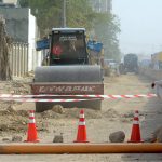 Heavy machinery is being used to extend the road as construction work continues in the Jail Chowrangi area under a city development project