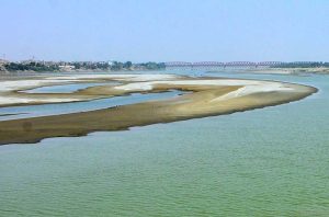 The dry bed of the Indus River at Hussainabad reflects the worsening water shortage affecting agriculture and daily life in nearby communities.