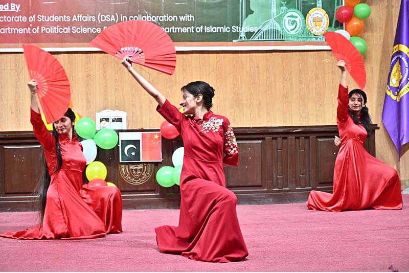 Students GCWUF presenting a tableau during commemorating 75 years of Pakistan-China Diplomatic Relations organize by Government College Women University Faisalabad (GCWUF) at Jinnah Auditorium