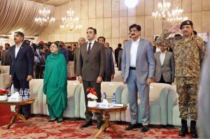 PPP Chairman Bilawal Bhutto Zardari, Sindh Chief Minister Syed Murad Ali Shah, and PPP Women Wing President Faryal Talpur stand in respect of the national anthem at the annual commemoration of Marka-e-Haq, organised by the Sindh government at a local hotel.