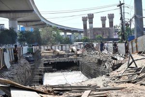 Workers busy in development work at Chaubarji Chowk.