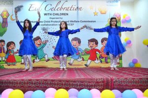 Secretary Social Welfare Sharif Hussain and Chief Child Commission Ijaz Khan along with other officials distributing Eid gifts among the children of Zamung Kor Institute and Special Education Complex.