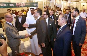 PPP Chairman Bilawal Bhutto Zardari, Sindh Chief Minister Syed Murad Ali Shah, and PPP Women Wing President Faryal Talpur stand in respect of the national anthem at the annual commemoration of Marka-e-Haq, organised by the Sindh government at a local hotel.