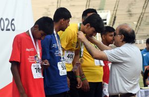 Federal Secretary for Inter-Provincial Coordination (IPC) and Director General of the Pakistan Sports Board, Mohyuddin Wani, presents medals to winners during Pakistan National Games 2026, organized by Special Olympics Pakistan, celebrating talent, courage, and inclusion of athletes with intellectual disabilities