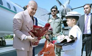 Prime Minister Muhammad Shehbaz Sharif arrives at Gilgit Baltistan. Flower bouquet being presented upon his arrival.
