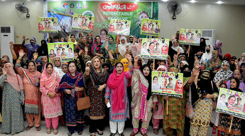 Women activists of Pakistan Muslim League-N raise slogans during a rally held to express solidarity with Pakistan Armed Forces and commemorate Marka-e-Haq in the city