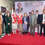 First Lady Bibi Aseefa Bhutto Zardari in a group photograph during her visit to the Pakistan Red Crescent Society Headquarters