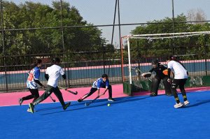 Players in action during a friendly hockey match between the Color and White teams of Fatima Women's Hockey Academy held at the Struff Hockey Stadium in connection with Marka-e-Haq