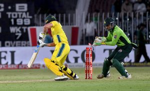 Australia’s Nathan Ellis plays a shot during the first One Day International cricket match between Pakistan and Australia at the Rawalpindi Cricket Stadium