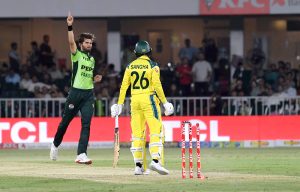 Australia’s Nathan Ellis plays a shot during the first One Day International cricket match between Pakistan and Australia at the Rawalpindi Cricket Stadium