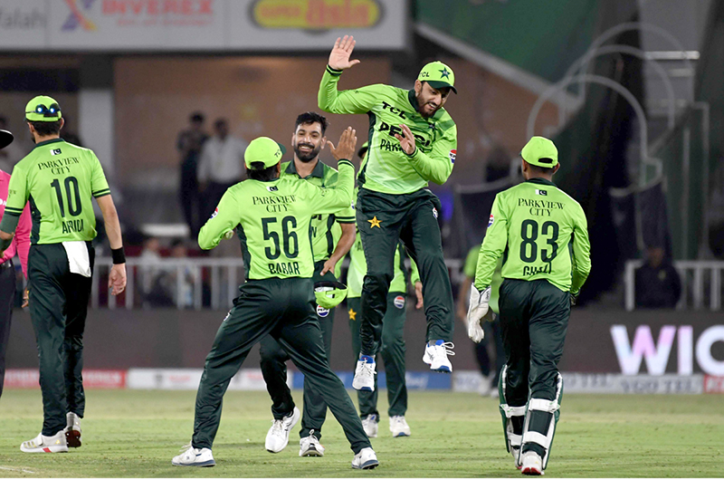Players of Pakistan national cricket team celebrate the dismissal of Billy Stanlake during the first One Day International (ODI) between Pakistan national cricket team and Australia national cricket team at the Rawalpindi Cricket Stadium