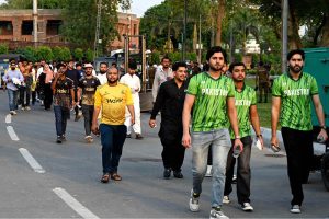 Spectators arrive in the stadium during the Pakistan Super League (PSL) final match between Hyderabad Kingsmen and Peshawar Zalmi at Gaddafi Stadium