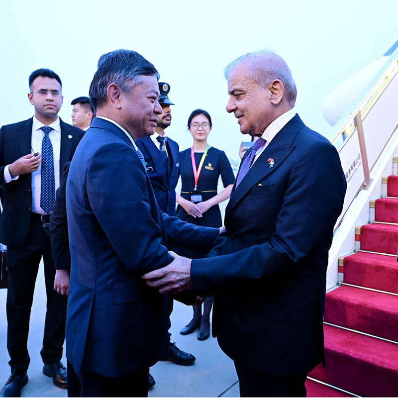Prime Minister Muhammad Shehbaz Sharif being received by Mr. Huang Runqiu, Minister of Environment & Ecology of China at Beijing Capital International Airport