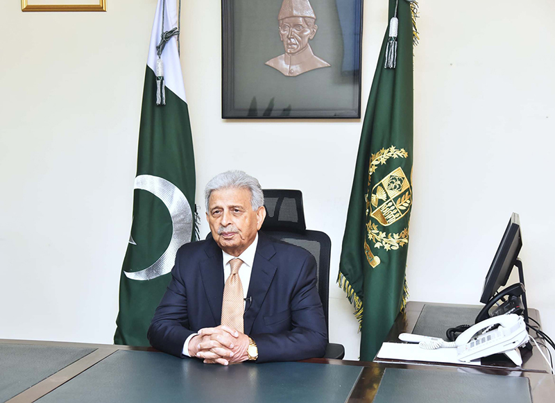 Federal Minister Rana Tanveer Hussain briefing media on Pakistan’s landmark IOC membership