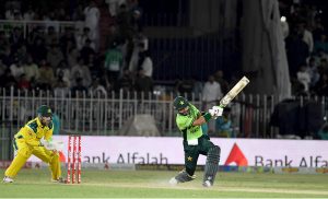 Australian national team players celebrate the wicket of Pakistan’s Sahibzada Farhan during the first One Day International (ODI) between Pakistan national cricket team and Australia national cricket team at the Rawalpindi Cricket Stadium