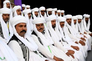 Artist seated in the stadium ahead of their performing during the Pakistan Super League (PSL) closing ceremony before final match between Hyderabad Kingsmen and Peshawar Zalmi at Gaddafi Stadium
