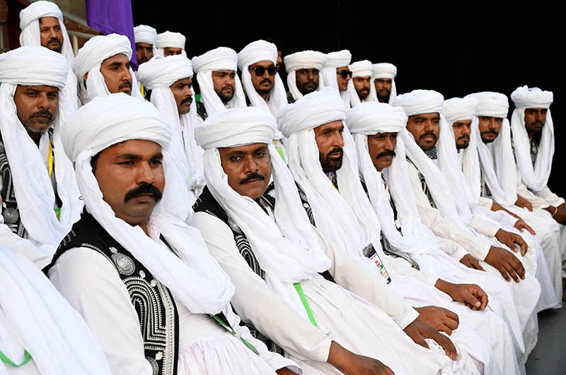 Artist seated in the stadium ahead of their performing during the Pakistan Super League (PSL) closing ceremony before final match between Hyderabad Kingsmen and Peshawar Zalmi at Gaddafi Stadium