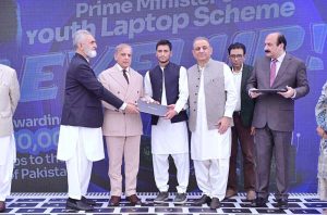 Prime Minister Muhammad Shehbaz Sharif distributes laptops among the beneficiaries from GB under PM's Youth Laptop Scheme.